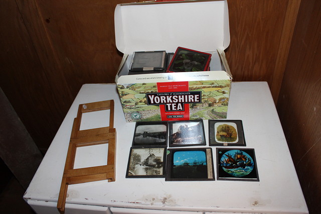 Appraisal: A COLLECTION OF MAGIC LANTERN SLIDES together with a slide