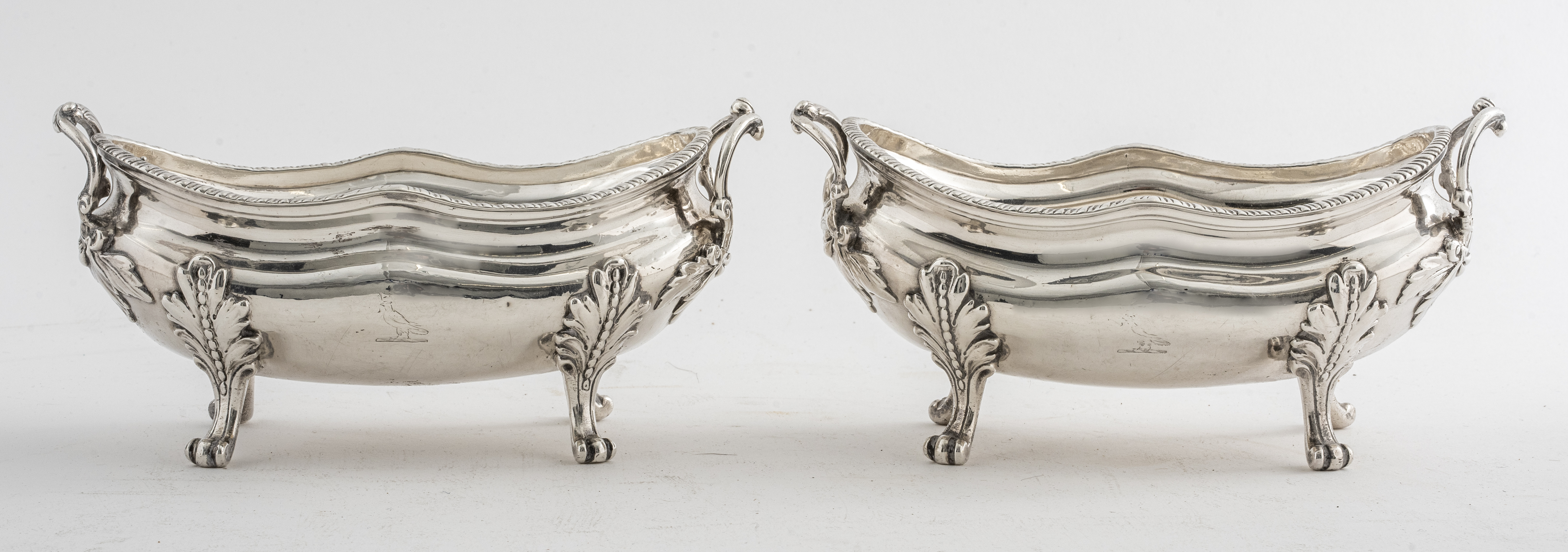 Appraisal: ENGLISH GEORGE III STERLING SAUCE BOATS English George III sterling