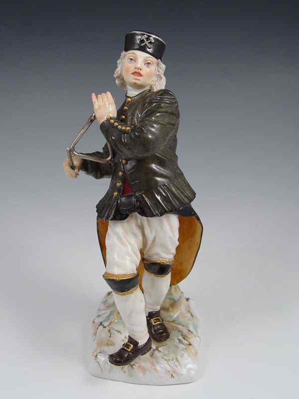 Appraisal: MEISSEN PORCELAIN FIGURE OF MUSICIAN WITH TRIANGLE Blue cross sword