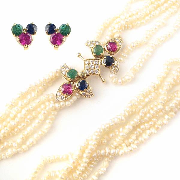 Appraisal: A seed pearl diamond ruby emerald sapphire and eighteen karat