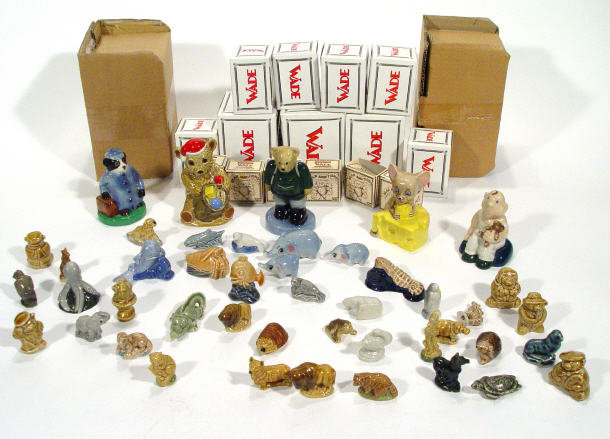 Appraisal: Extensive collection of Wade Whimsies Collectors Club figures including camping