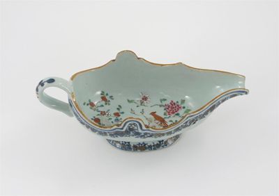 Appraisal: A Chinese famille rose silver-shaped sauce boat painted with two