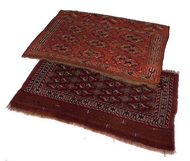 Appraisal: A Bokhara red ground rugcirca with elephant designs cm x