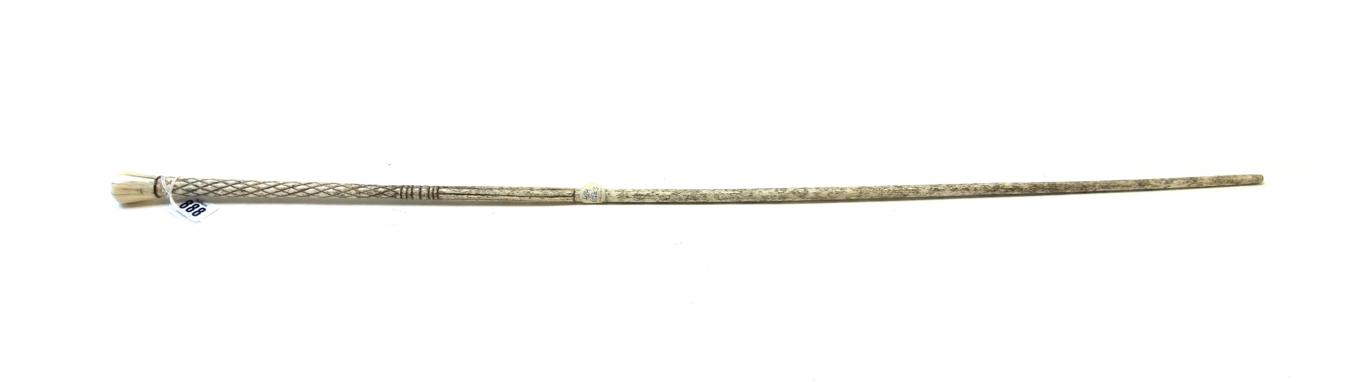 Appraisal: A whalebone walking cane mid- th century with marine ivory