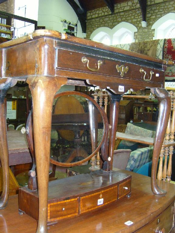 Appraisal: A Georgian oak side table with turret corners frieze drawer