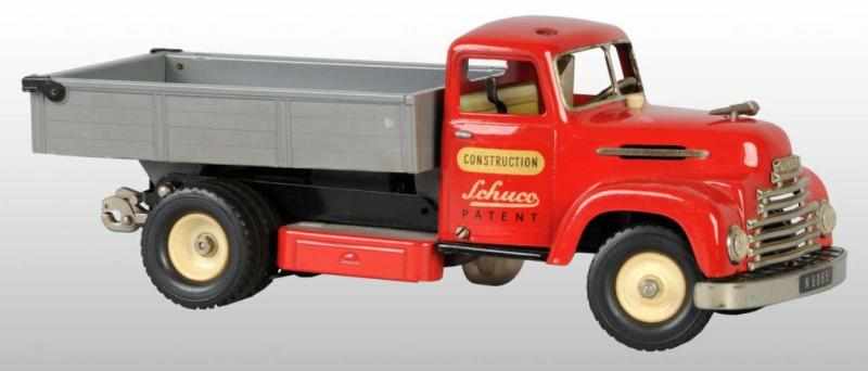 Appraisal: Tin Schuco Construction Truck Wind-Up Toy Description German Working Sounding