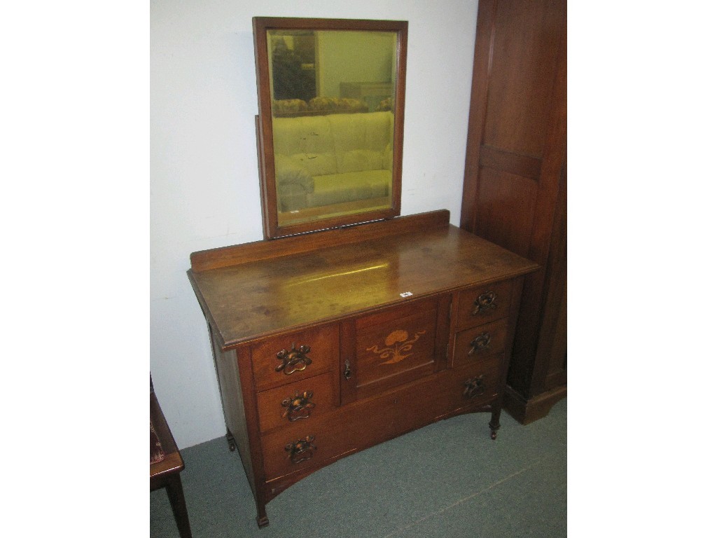 Appraisal: Art Nouveau mahogany mirror door wardrobe matching dressing table and