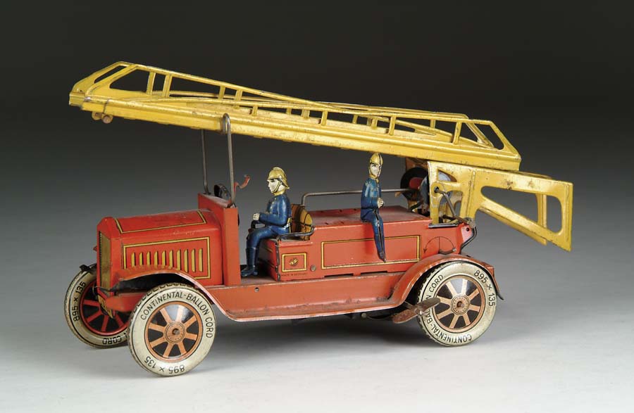 Appraisal: TIN WIND-UP GERMAN FIRETRUCK Extending ladder truck with two firemen