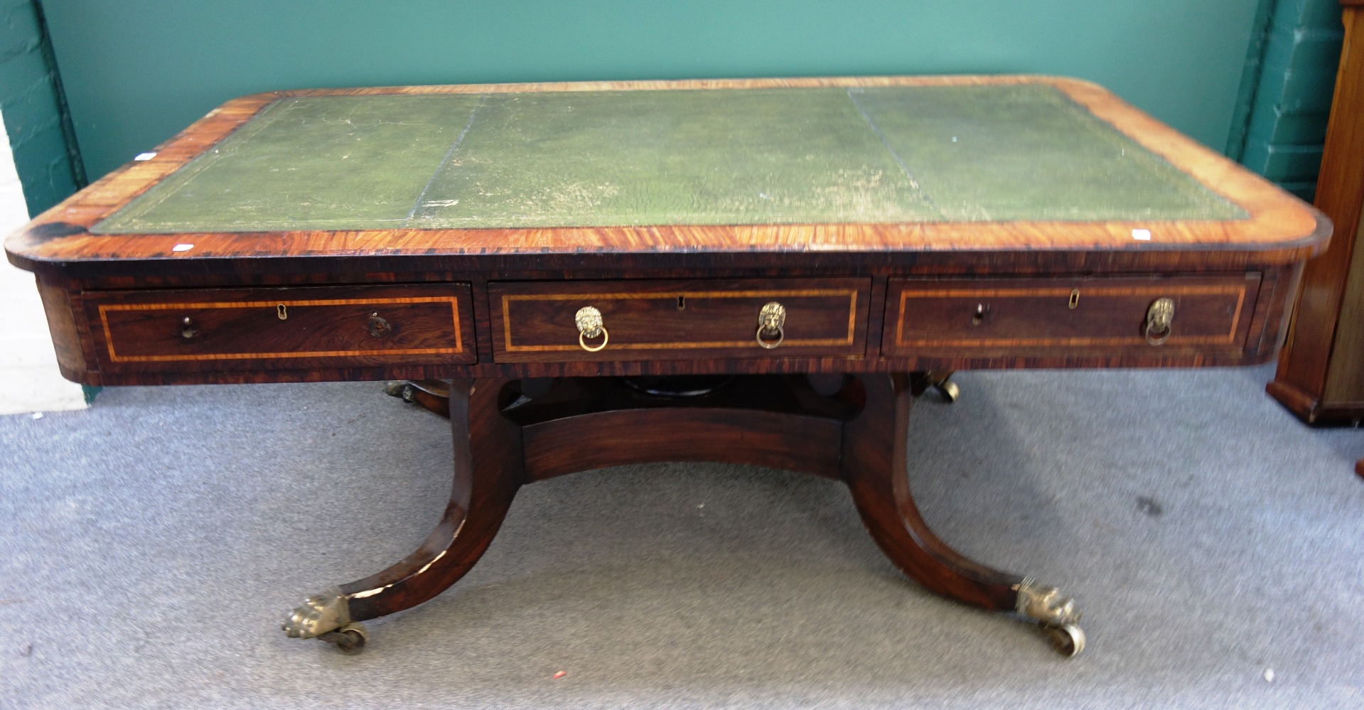 Appraisal: A Regency mahogany centre library table the leather inset rounded