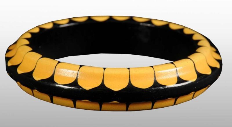 Appraisal: Bakelite Bow Tie Bracelet Carved to Point Description Rare Condition