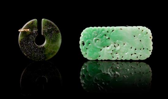 Appraisal: Sale Lot Two Hardstone Pendants the first a jadeite example