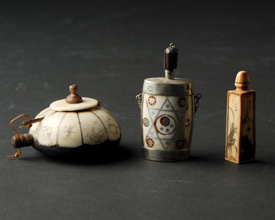 Appraisal: Three Bone or Ivory Snuff Bottles a triangle with scrimshaw