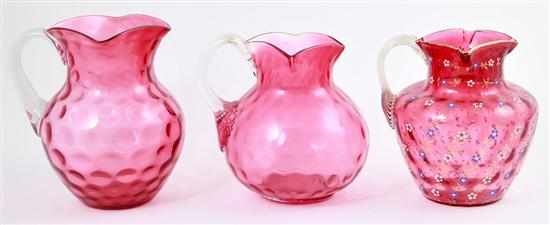 Appraisal: American cranberry glass pitchers late th early th century various