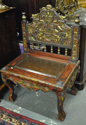 Appraisal: A pair of Indonesian Royal Java carved wood throne chairs