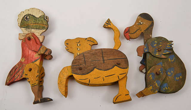 Appraisal: THREE PAINTED WOODEN ARTICULATED FIGURES from Alice in Wonderland consisting