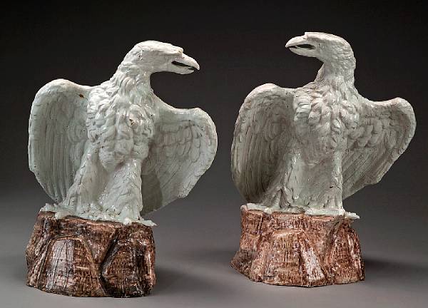 Appraisal: A pair of large glazed terracotta eagles th century Each