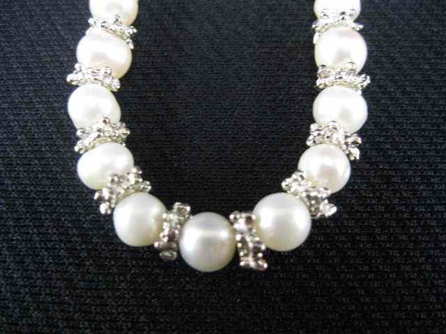 Appraisal: Pearl Necklace alternating silver spacers '' long freshwater cultured to