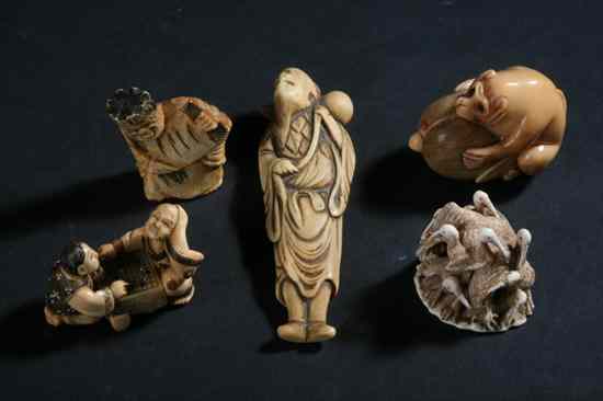 Appraisal: FOUR JAPANESE NETSUKE Meiji Period Together with an okimoro of