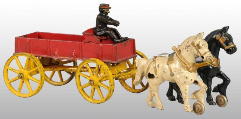 Appraisal: Cast Iron Kenton Farm Wagon Toy Description Pulled by a