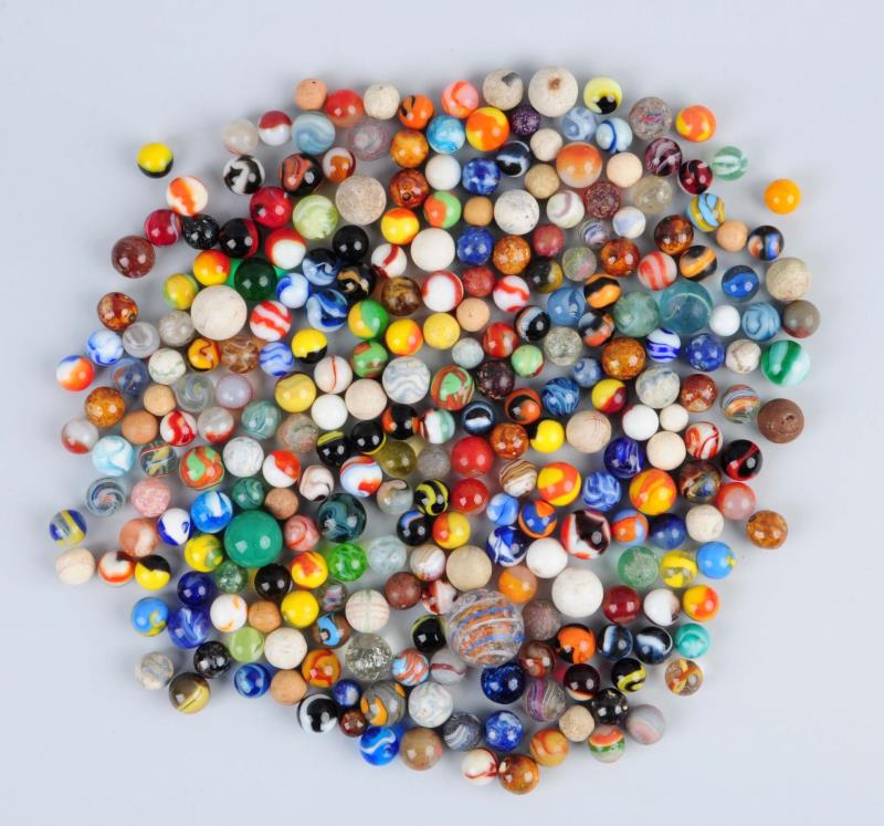 Appraisal: Large Lot Of Marbles This lot includes numerous small handmade