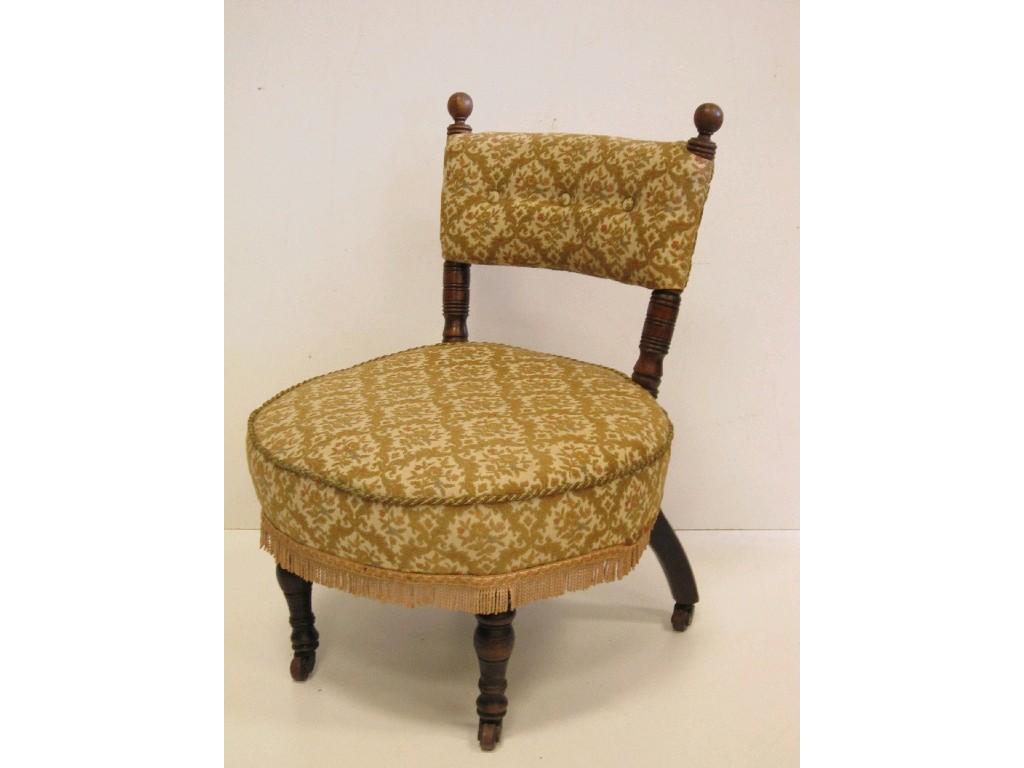 Appraisal: A Victorian Nursing Chair with upholstered back and seat on