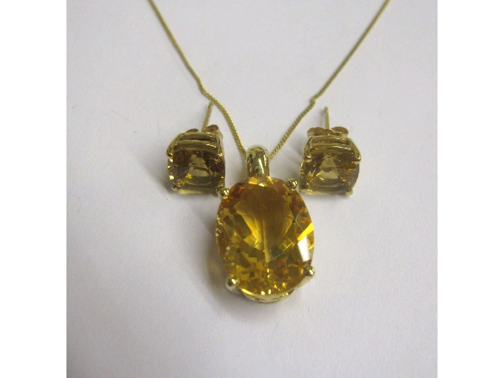 Appraisal: Oval citrine x mm in ct gold pendant mount on