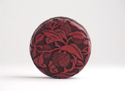 Appraisal: A Chinese carved red lacquer incense box and cover decorated