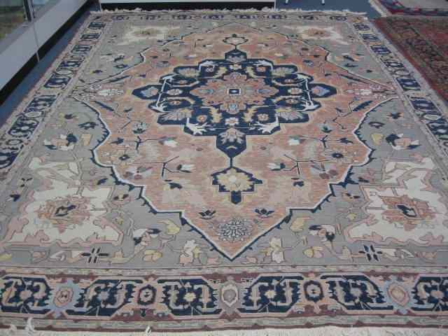 Appraisal: Heriz Style Persian Handmade Room Sizerug unusual weave great geometric