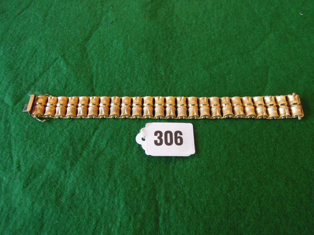 Appraisal: A gold bracelet of articulated bamboo design stamped gms