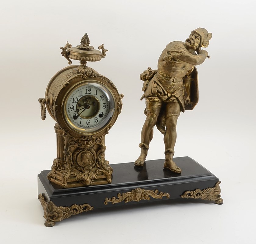 Appraisal: NEW HAVEN FIGURAL MANTLE CLOCK Gold paint decorated spelter figure