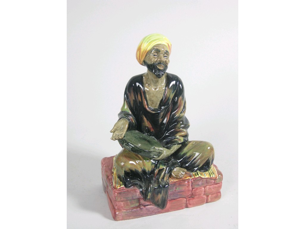 Appraisal: A Royal Doulton figure Mendicant HN seated figure in H