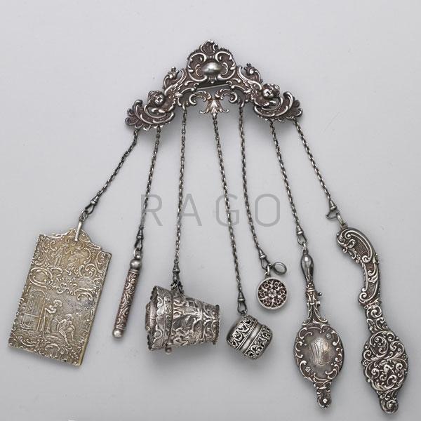 Appraisal: EDWARDIAN SILVER CHATELAINE Condition Report