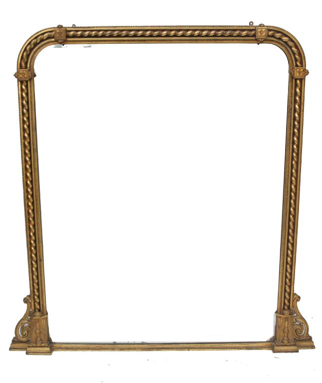 Appraisal: VICTORIAN GILT-COMPOSITION ARCHED OVERMANTEL MIRROR the original plate within a