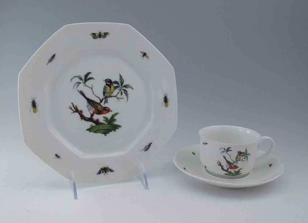 Appraisal: FRENCH LIMOGES CHINA DESSERT SET A Raynaud Decorated in birds