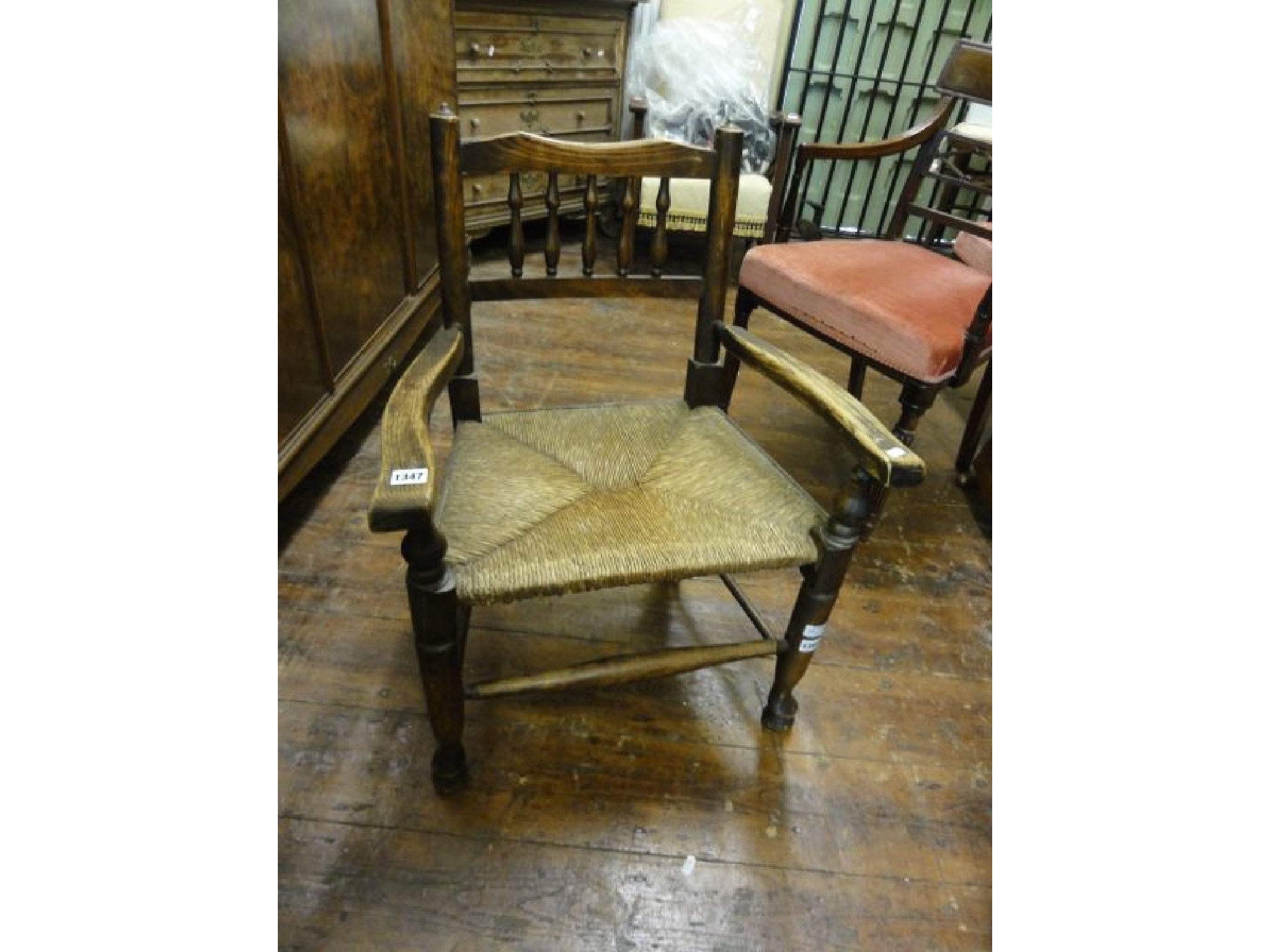 Appraisal: A th century ashwood elbow chair of small proportions with