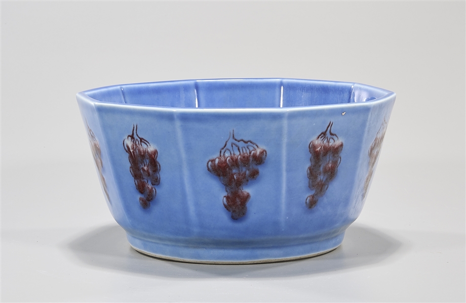 Appraisal: Chinese blue glazed porcelain ten-faceted bowl with red fruit decoration