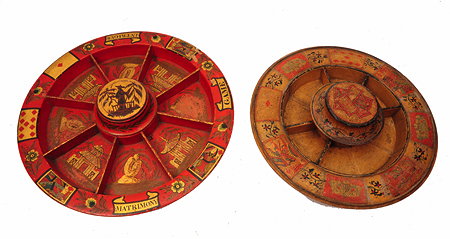 Appraisal: A REGENCY RED LACQUERED CIRCULAR GAME BOARD FOR 'POPE JOAN'