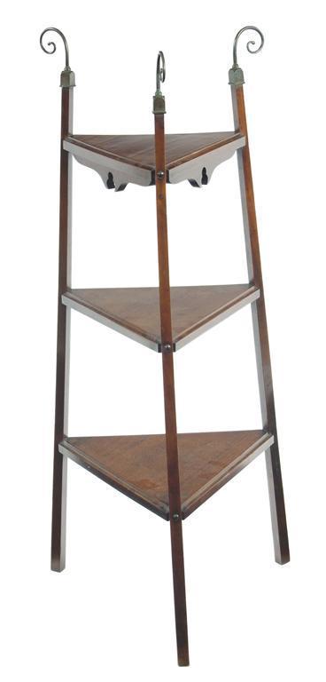 Appraisal: Marine Interest A late Victorian walnut triangular three tier