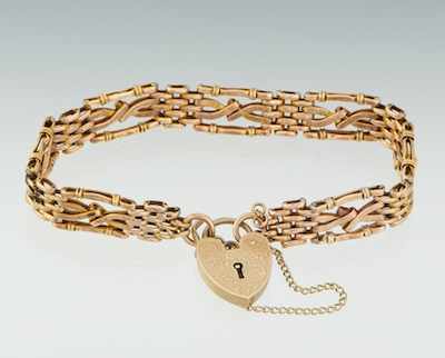 Appraisal: A Victorian Heart Padlock Charm Bracelet k yellow gold heart