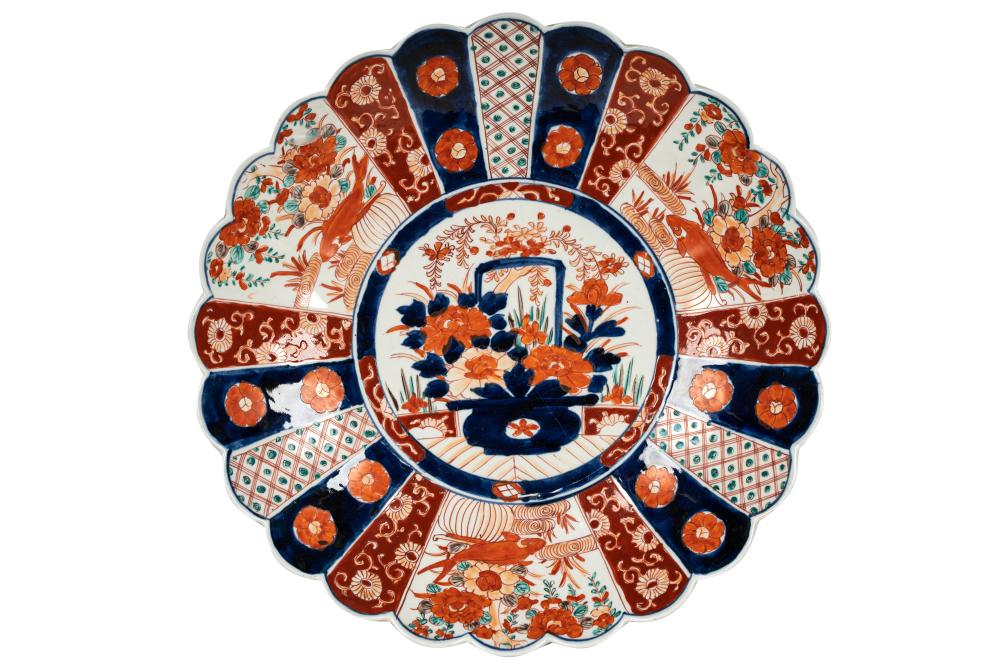 Appraisal: ROUND JAPANESE IMARI PLATTERCondition with crack running from footed base