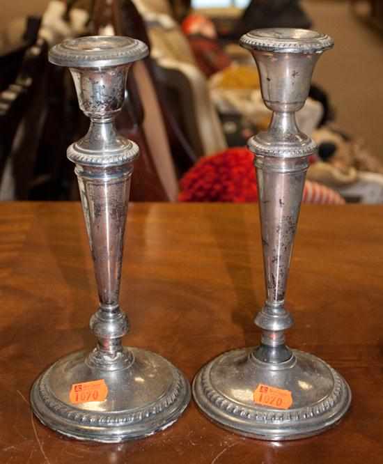 Appraisal: Pair of sterling silver weighted candlesticks Estimate - No condition