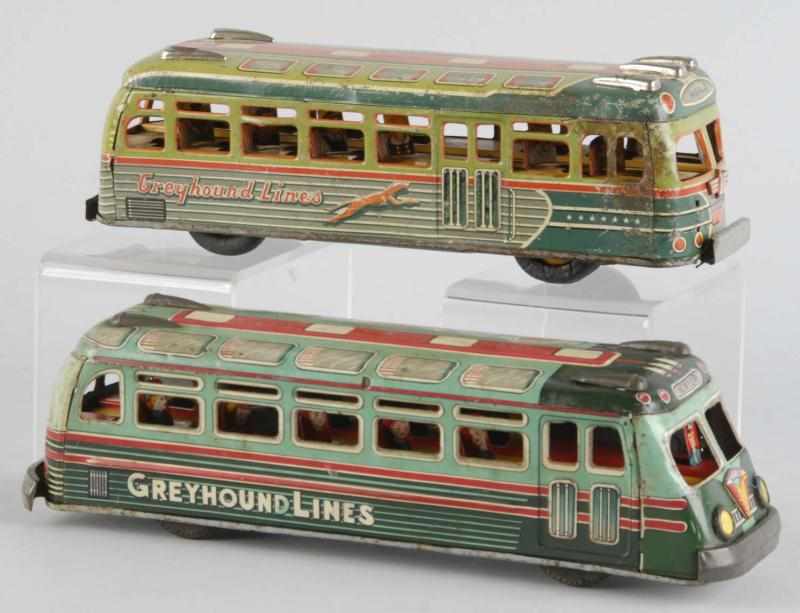 Appraisal: Lot of Tin Greyhound Line Bus Friction Toys Description Japanese