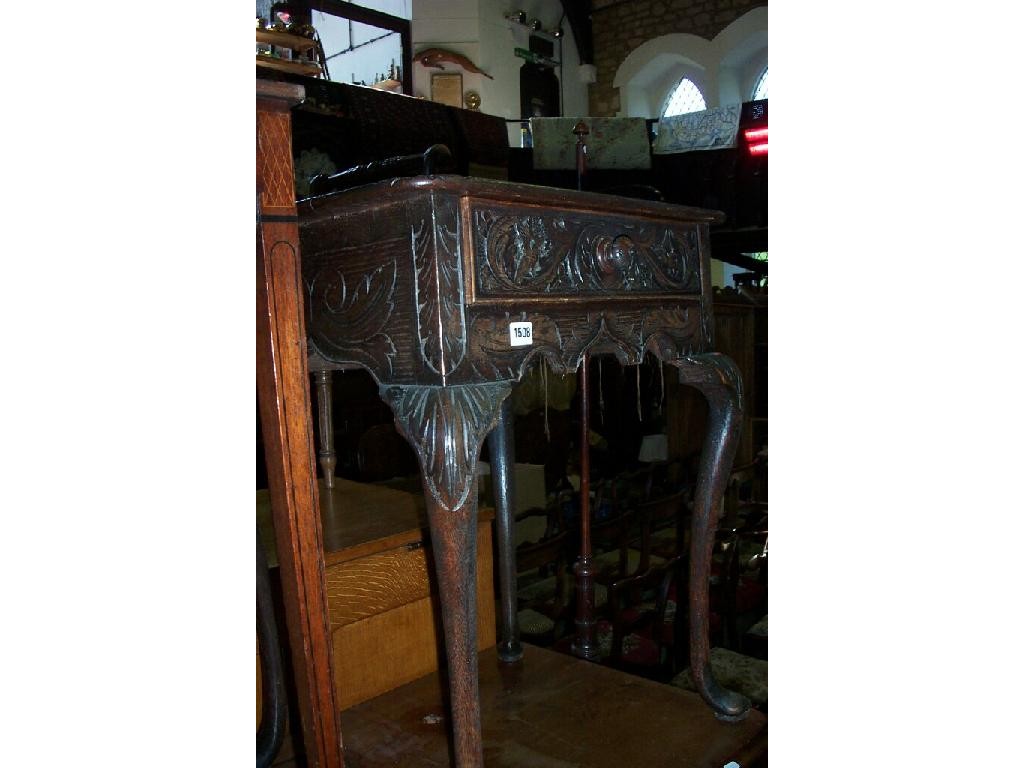 Appraisal: A th century oak side table fitted with a single