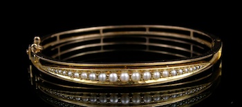 Appraisal: An Edwardian Seed Pearl and k Gold Bangle Bracelet Stamped