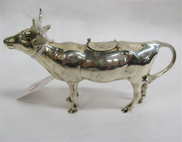 Appraisal: STERLING SILVER FIGURAL COW CREAMER A COLT pieces the cream