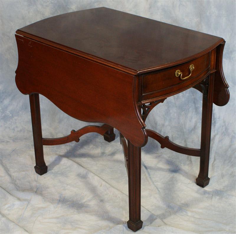 Appraisal: Mahogany Philadelphia Chippendale style Pembroke table with arched stretcher by