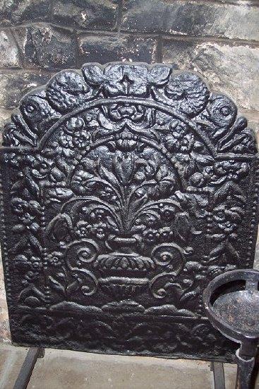 Appraisal: A th Century style cast iron fireback with vase of