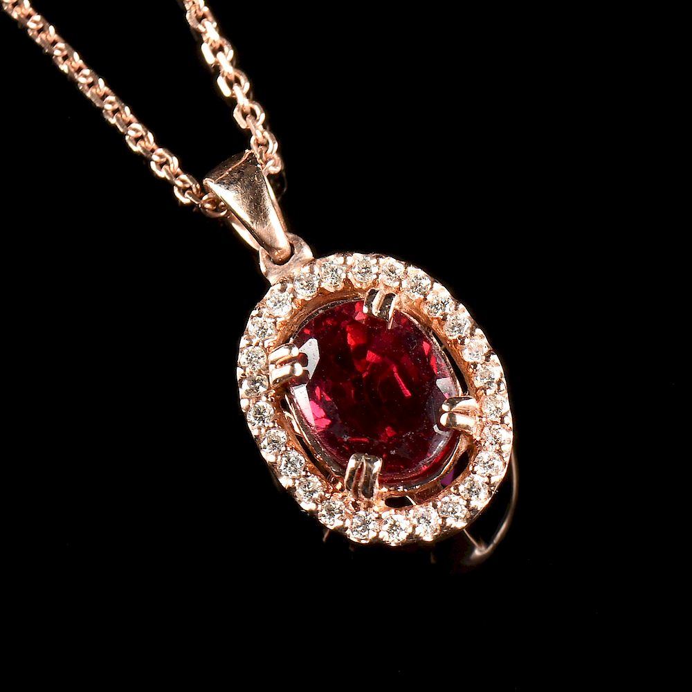 Appraisal: A K ROSE GOLD RUBY AND DIAMOND LADY'S PENDANT NECKLACE