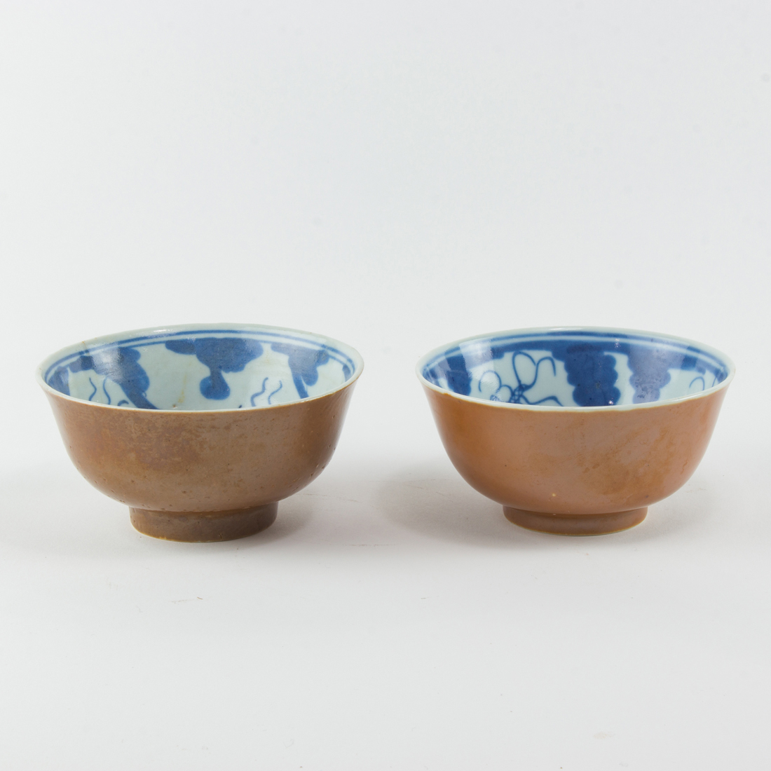 Appraisal: PAIR OF CHINESE CAFE-AU-LAIT AND BLUE AND WHITE BOWLS Pair