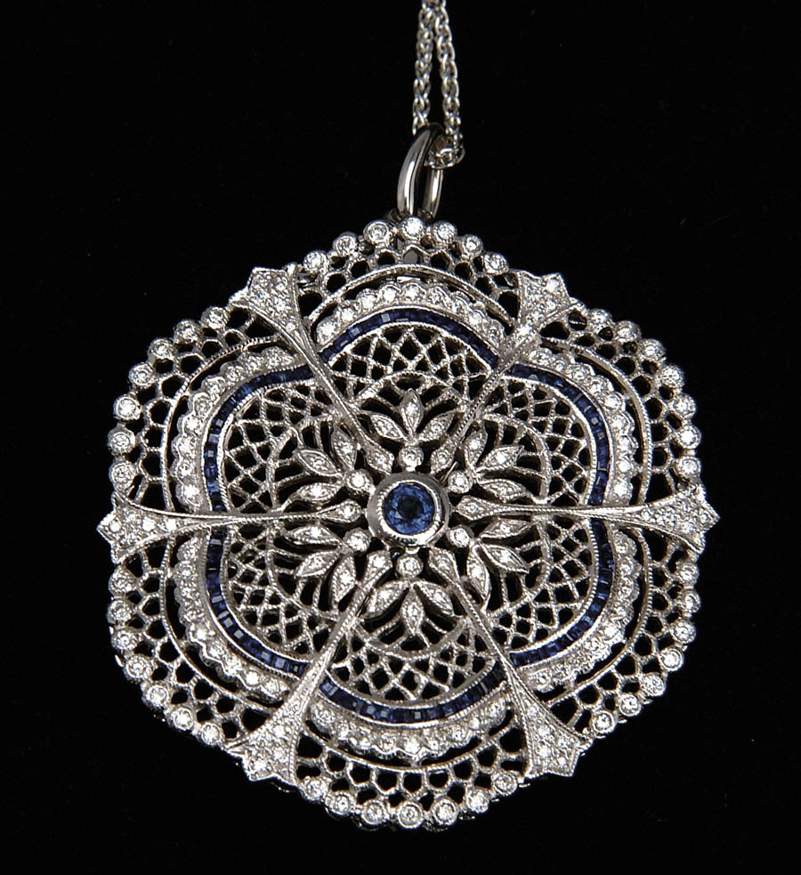 Appraisal: DIAMOND AND SAPPHIRE PENDANT BROOCH Very pretty kt white gold